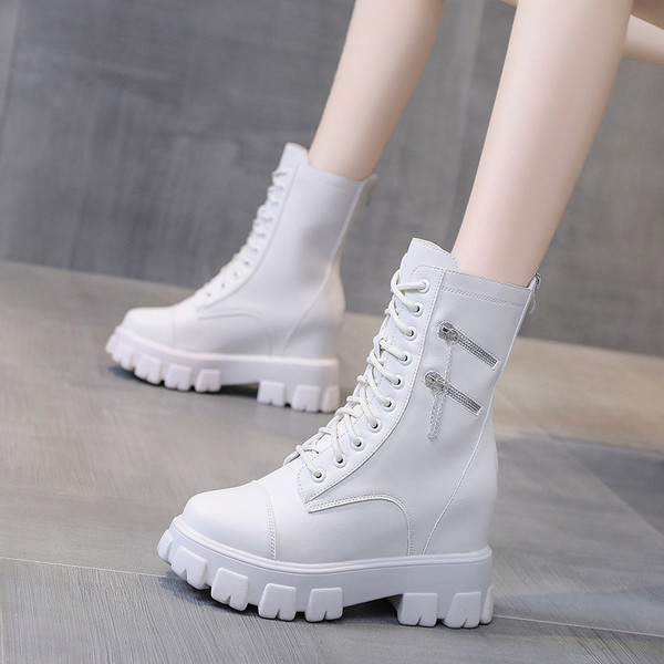 Jelenlegi női bőrcsizma cipzárral, magas talppal