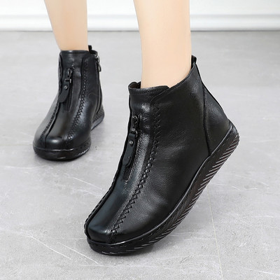 Γυναικείες μπότες με φερμουάρ από eco δερμάτινα casual μοντέλο