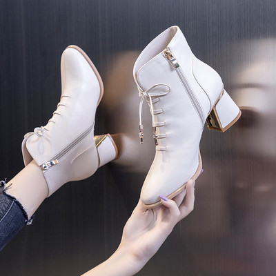 Új modell női csizma műbőr fűzővel