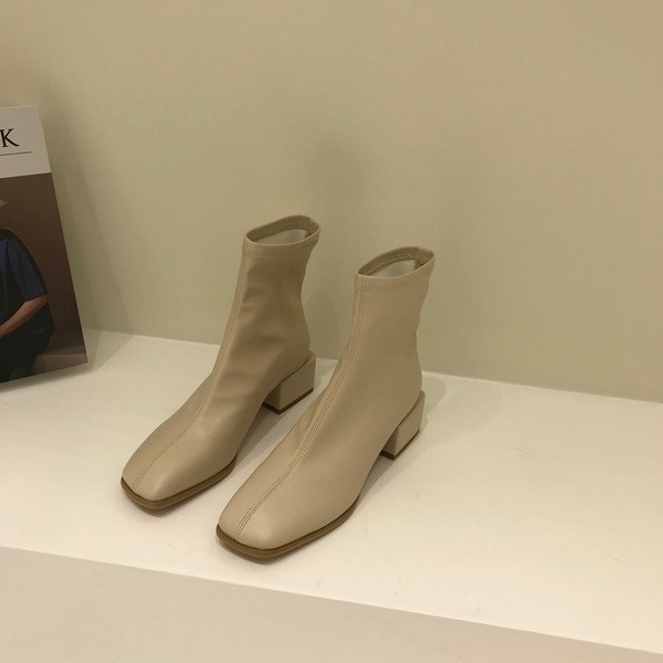 Γυναικείες μοντέρνες μπότες από οικολογικό δέρμα με πάχος 4 cm