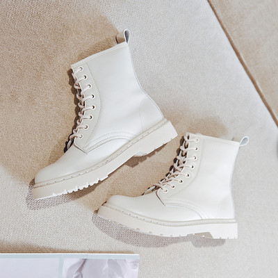 Modern bőrcsizma fűzős és cipzáras sima modell