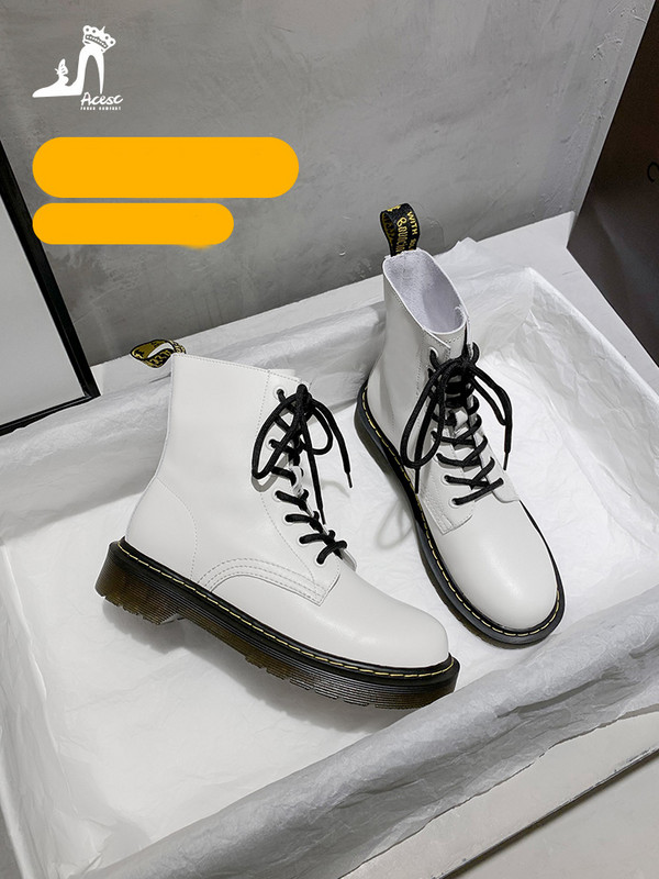 Modern bőrcsizma fűzős és cipzáras sima modell