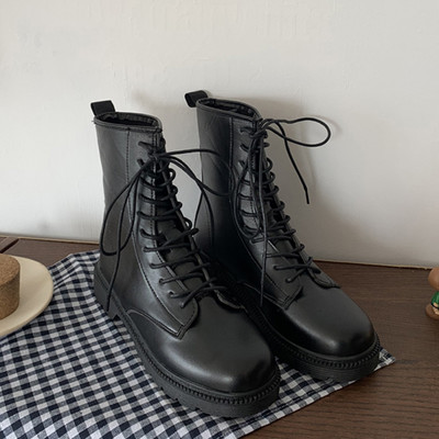 Ādas sieviešu ziemas zābaki ar plakanu zoli