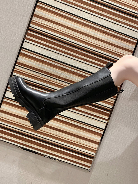 Nahast naiste talvesaapad või kõrge tallaga saapad