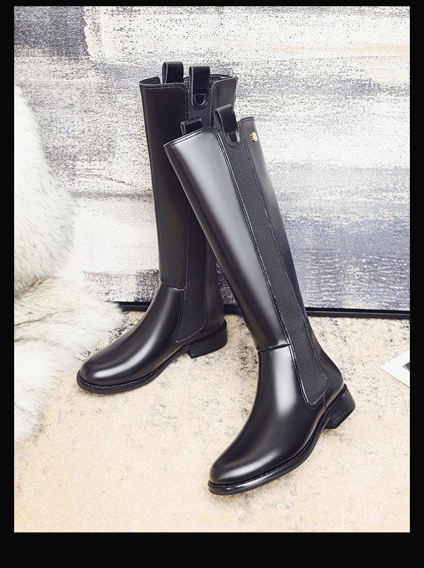 Praegused naiste mustad ökonahast saapad voodriga või ilma