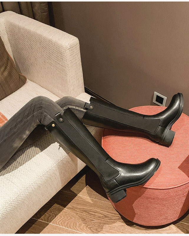 Praegused naiste mustad ökonahast saapad voodriga või ilma