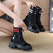 Moodsad musta värvi krobelise tallaga naiste lakknahast saapad