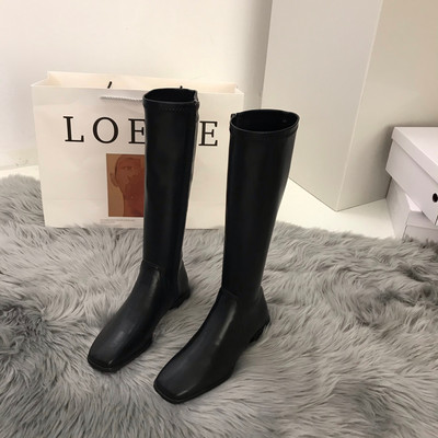 Női bőrcsizma, szögletes sarokkal