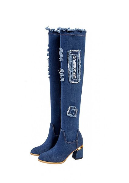 Naiste teksasaapad kontsa ja lukuga