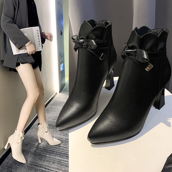 Női műbőr csizma új modellje fehér és fekete színben