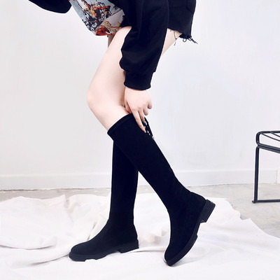 Öko-seemisnahast musta värvi paelte ja lameda tallaga naiste saapad