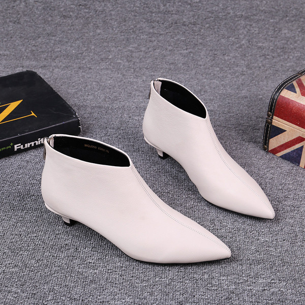 Öko-nahast valmistatud terava otsaga naiste saapad uus mudel