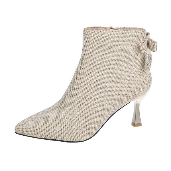 Stiilsed naiste saapad paela ja 7 cm õhukese kontsaga – läikiva efektiga