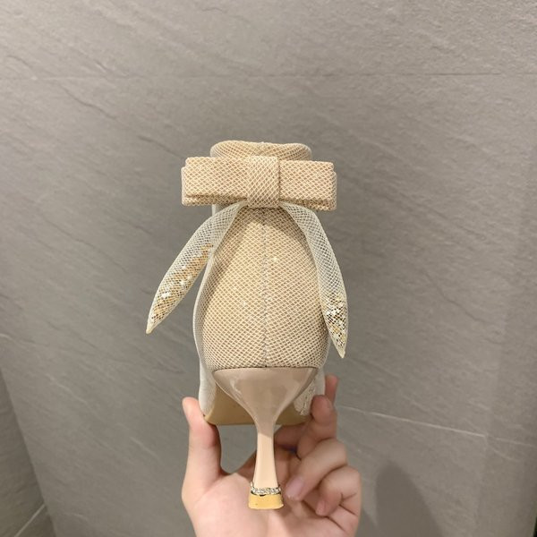 Stiilsed naiste saapad paela ja 7 cm õhukese kontsaga – läikiva efektiga