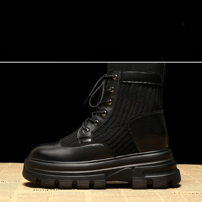 Női alkalmi csizma fekete színben, fűzővel és lapos talppal