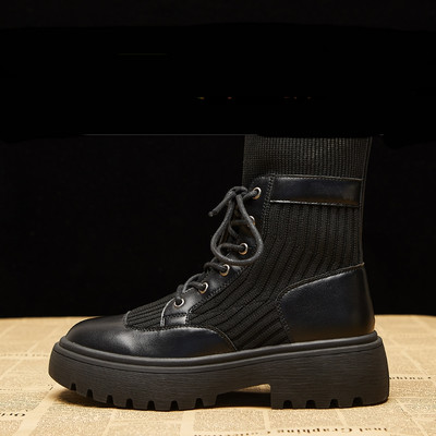 Női alkalmi csizma fekete színben, fűzővel és lapos talppal