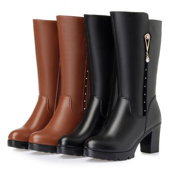 Kandilise paksu kontsaga ja pehme voodriga nahast naiste saapad