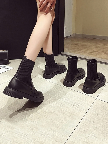 Praegused mustad naiste saapad ümara tallaga mudel