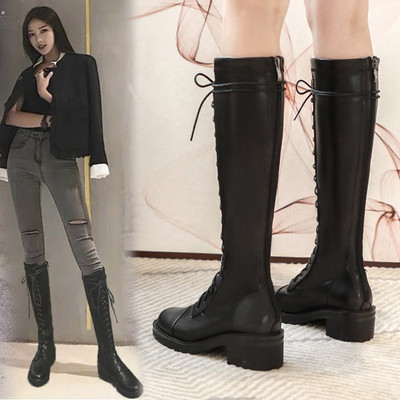 Bőr női fekete csizma lapos talppal és fűzővel