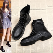 Mustad pandla ja paeltega naiste saapad