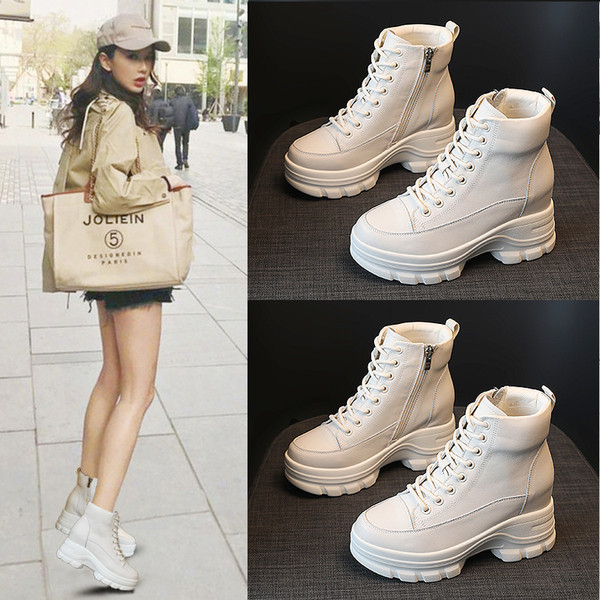 Női bőr téli csizma fűzővel és magas talppal