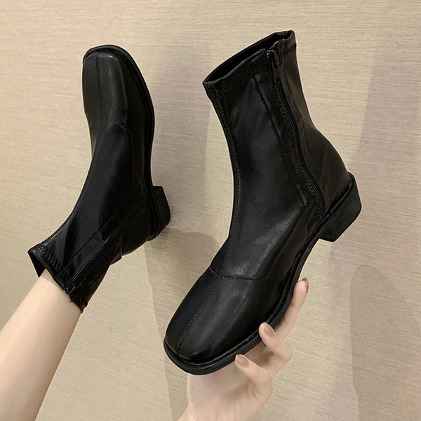 Ženske kožne čizme na nisku petu i patent zatvarač