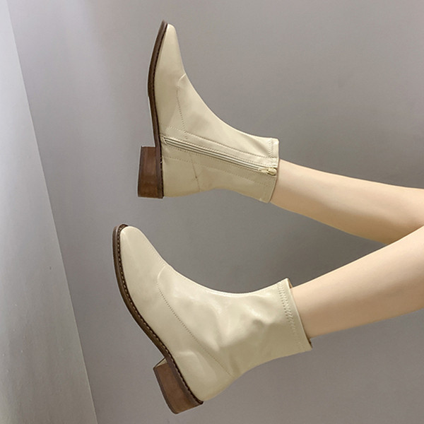 Ženske kožne čizme na nisku petu i patent zatvarač