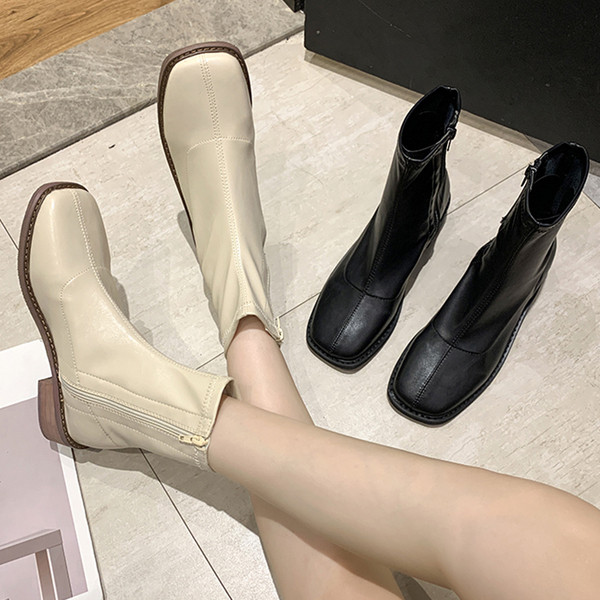 Ženske kožne čizme na nisku petu i patent zatvarač