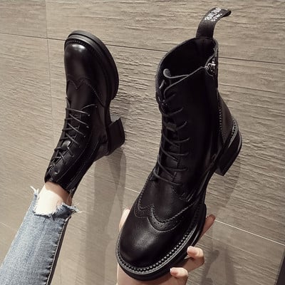 Öko bőrből készült fekete női csizma fűzővel