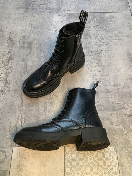 Öko bőrből készült fekete női csizma fűzővel