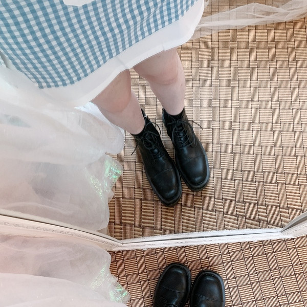 Ādas sieviešu ziemas zābaki