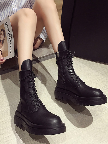 Alkalmi női csizma vagy eco bőrből készült csizma magas talppal és fűzővel