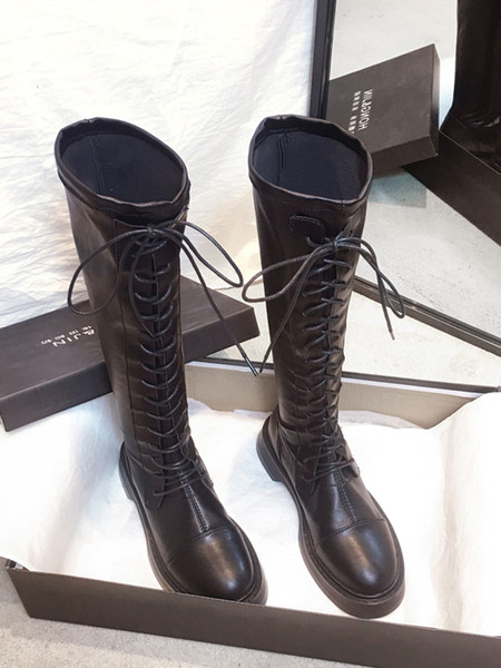 Praegused ökonahast lameda talla ja paeltega naiste saapad