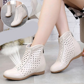 Alkalmi női bőrcsizma cipzárral, lapos talppal