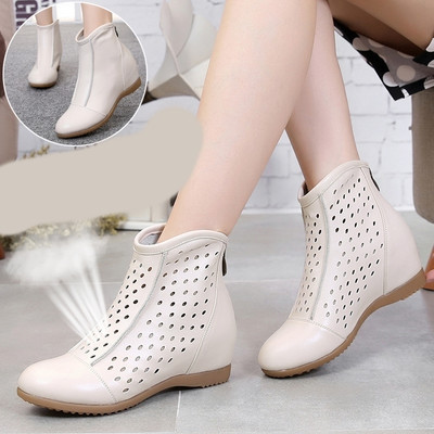 Alkalmi női bőrcsizma cipzárral, lapos talppal