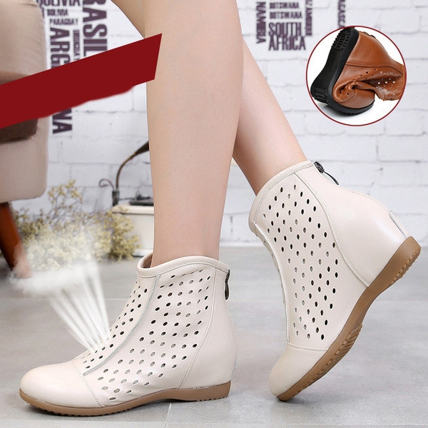 Alkalmi női bőrcsizma cipzárral, lapos talppal