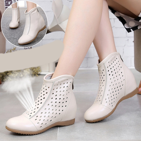 Alkalmi női bőrcsizma cipzárral, lapos talppal