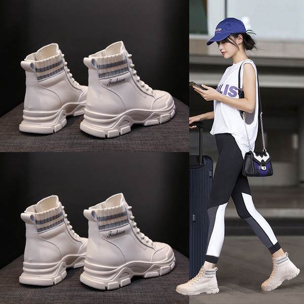 Alkalmi női csizma fűzővel és gumival