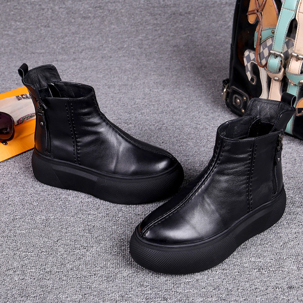 Női fekete bőrcsizma, magas talppal