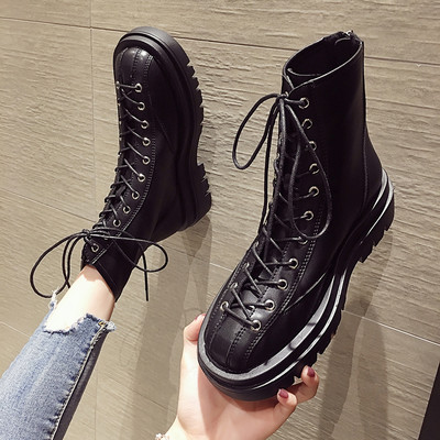 Γυναικείες μοντέρνες μπότες από οικολογικό δέρμα με ψηλές σόλες και κορδόνια