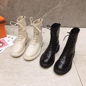 Naiste Kuuba saapad paelte ja lameda tallaga