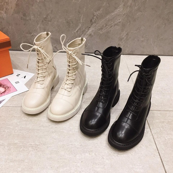 Naiste Kuuba saapad paelte ja lameda tallaga