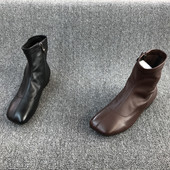 Naiste saapad ümara kujuga lameda talla ja lukuga