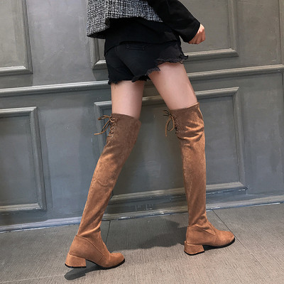 Moodsad naiste saapad üle põlve paksude kontsade ja paeltega