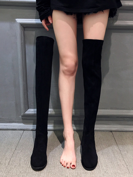 Moodsad naiste saapad üle põlve paksude kontsade ja paeltega