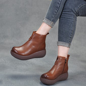 Bőr női téli csizma magas talppal