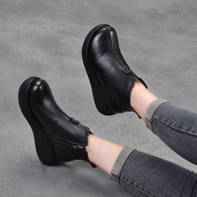 Bőr női téli csizma magas talppal