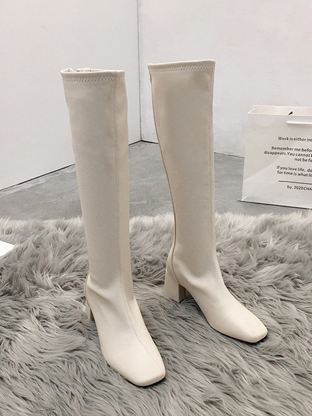 Stílusos női csizma eko bőrből, vastag sarokkal és cipzárral