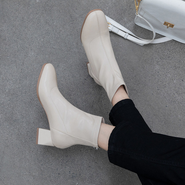 Naiste ümarad ökonahast madala kontsaga saapad