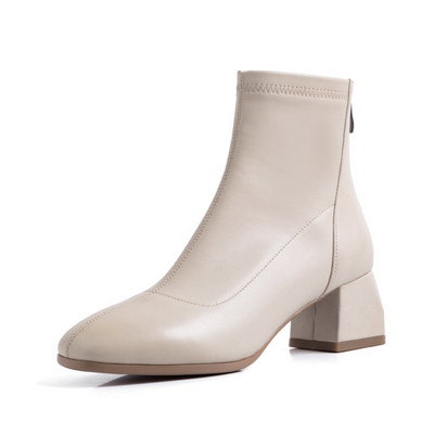 Őszi bőrcsizma alacsony vastag sarokkal és cipzárral